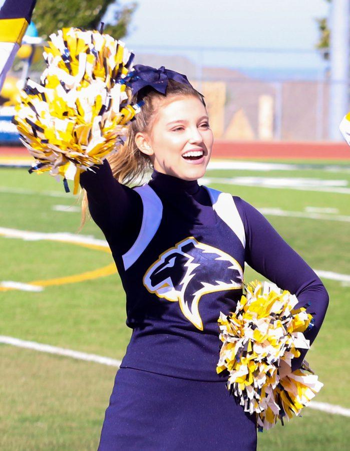 Senior Berkeley Taylor cheers at the Homecoming Pep Rally. I was tired of trying to meet everyone else’s expectations of me, she said. Berkeley now finds relief and identity in Christ.