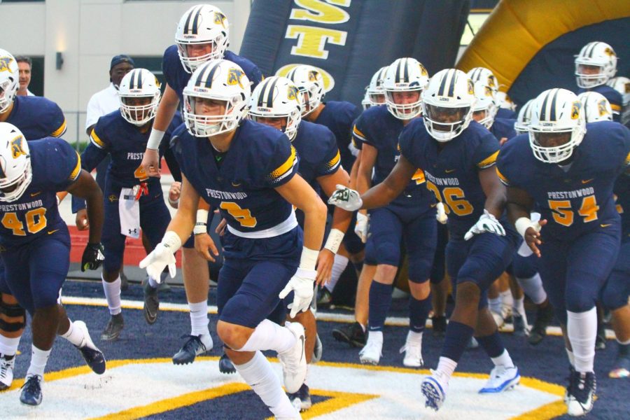 Players excitedly exit the tunnel to compete in the first Varsity home game against the Greater Atlanta Christian School Spartans on September 7th, 2018. The lightning delay did not keep the Lions from winning the game against GAC by a score of 13-7.  