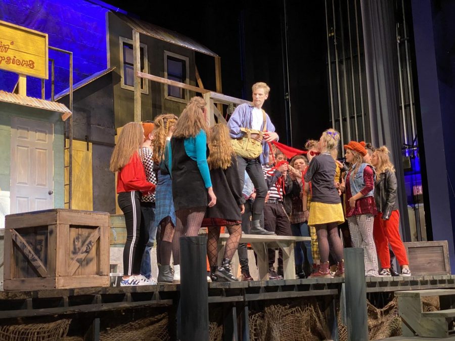Senior Hunter Hall brings his character to life on stage in Godspell.