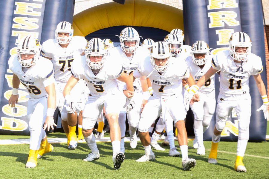 Charged up and ready for battle, the players head out of the tunnel after final words from the Captains. Senior lineman Gabe McGill said, "As a Captain on the team, I have learned that leadership should not be taken for granted. In order to truly be the best leader you can be, you have to speak up."