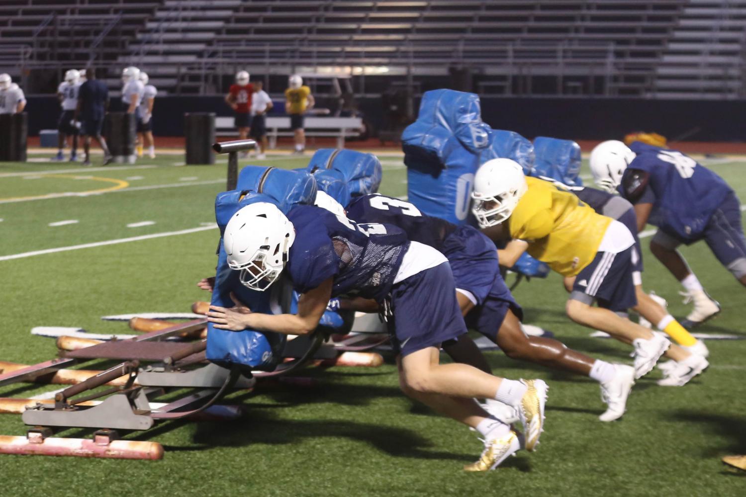 August practice means drills and conditioning to ready the Lions for their fall schedule. The early 6 a.m. start required discipline and dedication from the players.