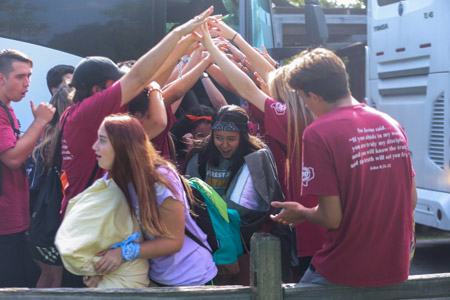 The Seniors follow tradition with their welcome celebration, jumping and shouting as the other students get off of the bus. Junior Karen Sculley said, “It was really cool seeing all the Seniors so excited when we got there. It definitely helped us grow closer as a high school and not be so divided among the classes.”

