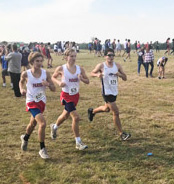 Senior Evan Reyna races the course at the District Cross Country meet near Joe Pool Lake.