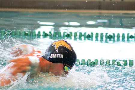 Junior Colton Smith trains to improve his endurance during a team practice.