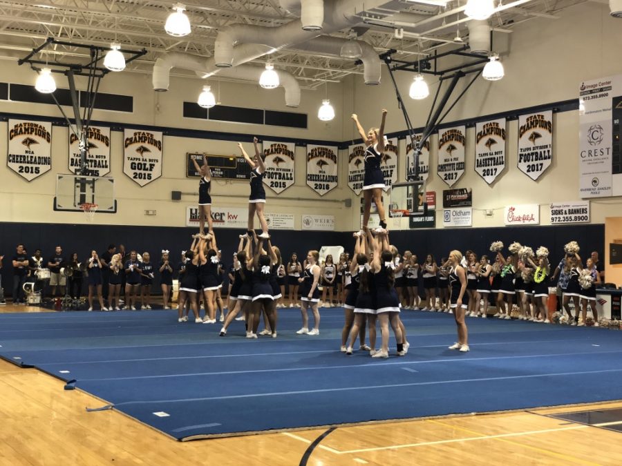 The Varsity Cheerleaders take the mat to encourage spirit among the student body. The level of excitement was palpable in preparation for the first home game.    