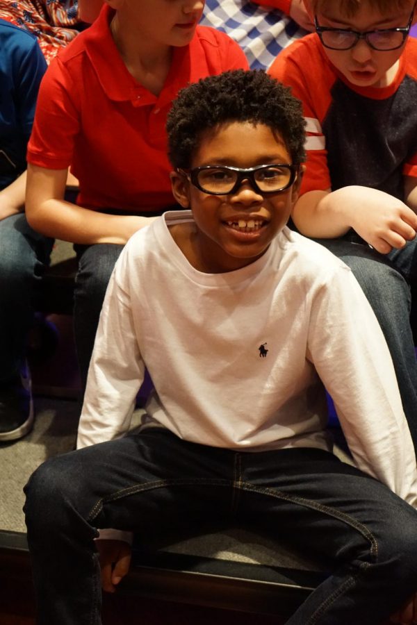 Second Grade student Trey Beckles performs during Let George Do It. 