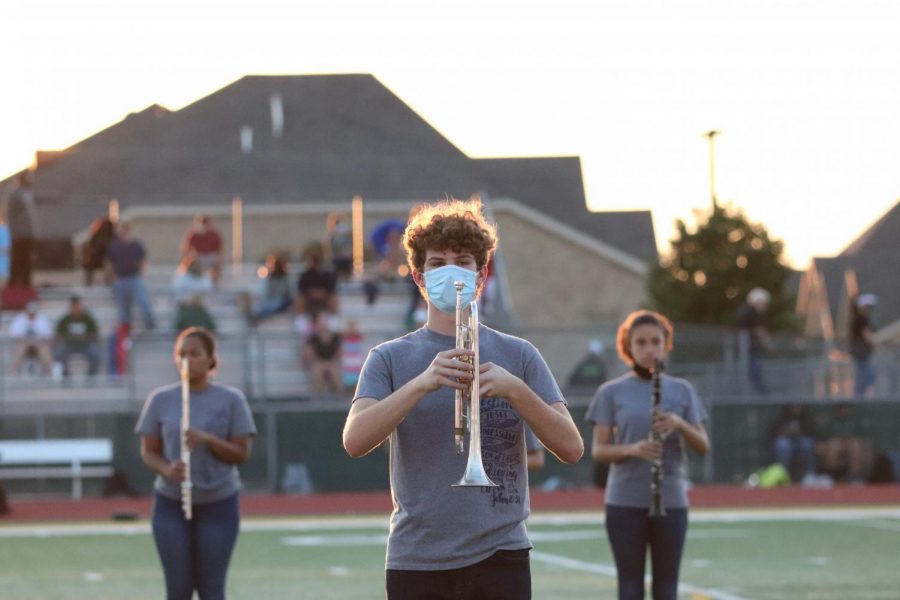 Hayden Taylor (10) gets ready to march to beat of his trumpet.