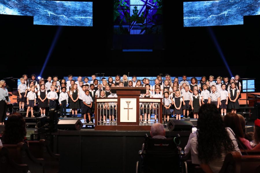 The lower school students perform in front of their grandparents.