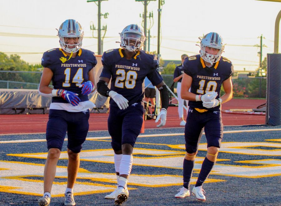 Joshua Escheik, Tarris Murray, and Troop O’Neal with big smiles in the Lions end zone after capturing a touchdown. This is the feeling of winning.