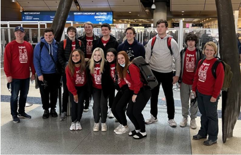 The Northern England trip at the airport on their way to England. 
