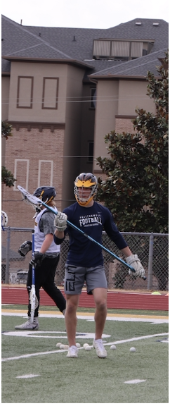 Senior Tyler Chambers prepares to defend his teammate. 
