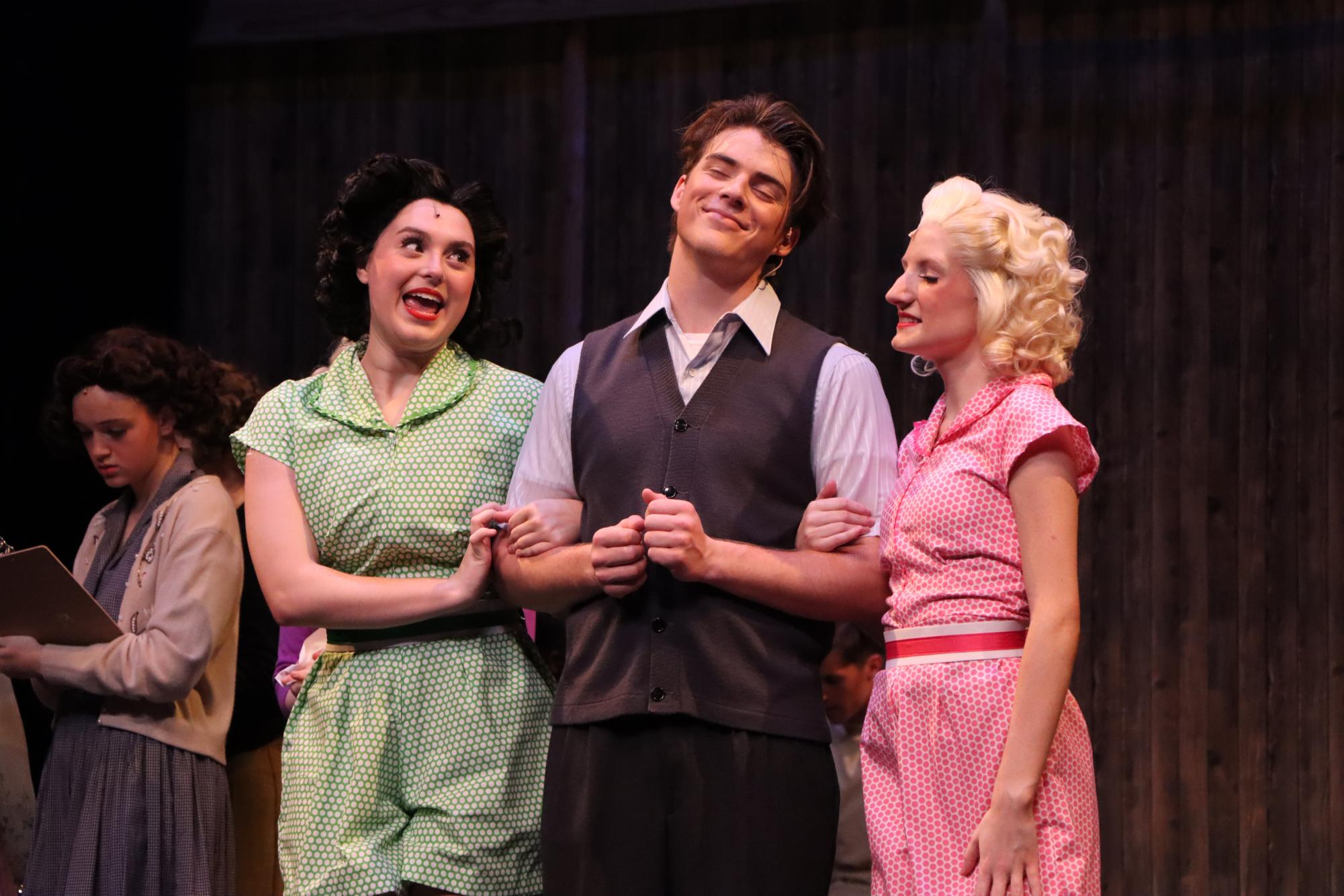 Juniors Ava Grace Harbison, Brady Palmer, and Ashlyn Hardy star in "White Christmas." 