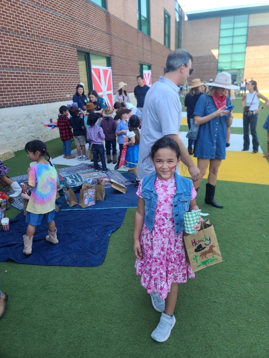 Kindergarten student Makenzie Polite enjoys the annual Kindergarten State Fair. Makenzie is in Mrs. Jenny Master's Kindergarten class.